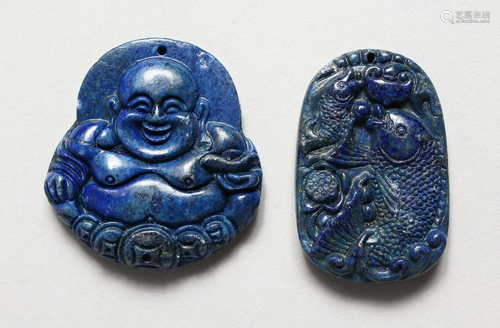 TWO CHINESE CARVED LAPIS PENDANTS