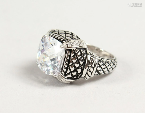 A SILVER AND CZ RING