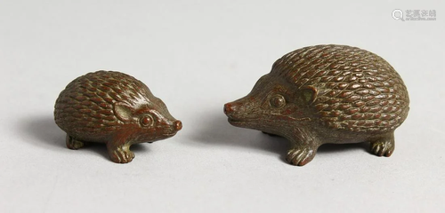 TWO SMALL BRONZE HEDGEHOGS, 2 ins and 1.25 ins