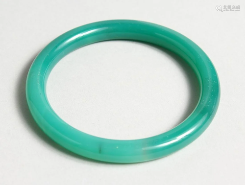 A GOOD JADE BANGLE, 3 inches diameter.