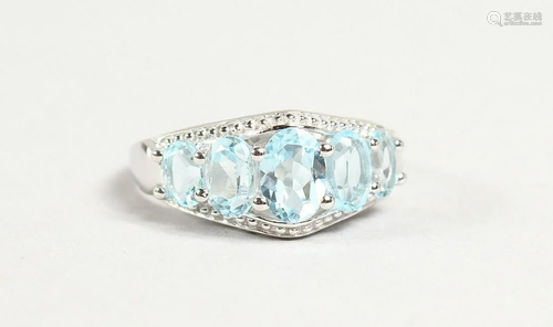 A SILVER FIVE STONE AQUAMARINE RING