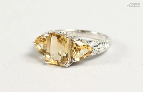 A THREE STONE CITRINE RING