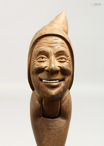 A CARVED WOOD DWARF NUTCRACKER.