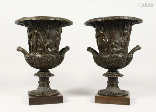 A GOOD PAIR OF CLASSICAL TWO HANDLED BRONZE URNS on
