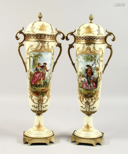 A VERY GOOD PAIR OF FRENCH PORCELAIN TWO-HANDLED…