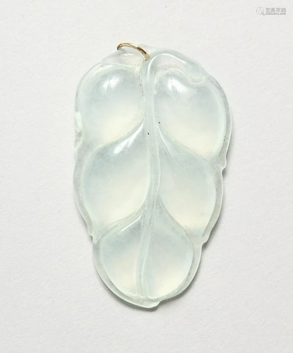 AN ICY WHITE CARVED JADE PENDANT