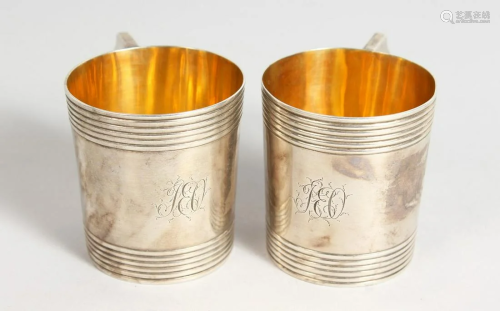 A SMALL PAIR OF GEORGE II SILVER MUGS, 2.75 ins, 2.75
