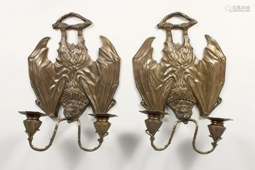 A PAIR OF BRONZE BAT WALL SCONCES each with two