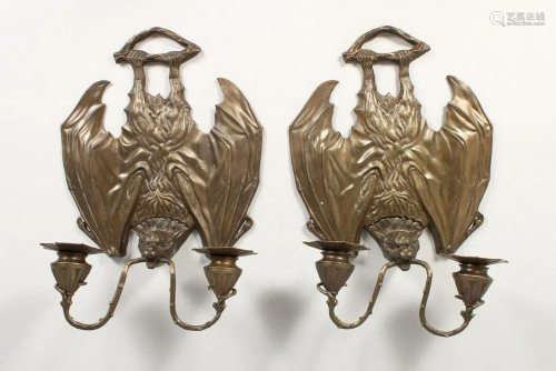 A PAIR OF BRONZE BAT WALL SCONCES each with two
