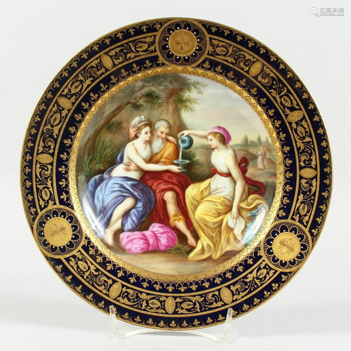 A GOOD VIENNA CIRCULAR PLATE, blue and gilt border, the