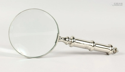 A CHROME MAGNIFYING GLASS