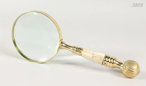 A MOTHER OF PEARL MAGNIFYING GLASS