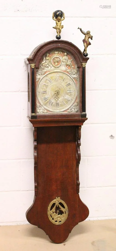 A DUTCH OAK CASED FRIESLAND WALL CLOCK, with embo…