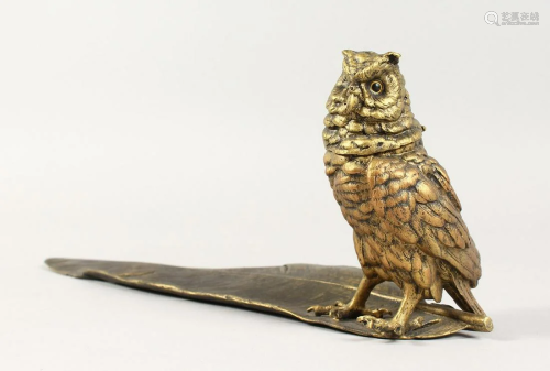 A COLD CAST OWL ON A FEATHER INKWELL 12 ins long