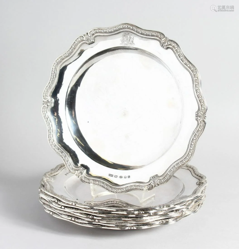 A SET OF EIGHT ODIOT OF PARIS CAST SILVER DINNER PLATES