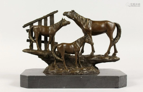 A BRONZE GROUP OF THREE HORSES on a marble base. 10