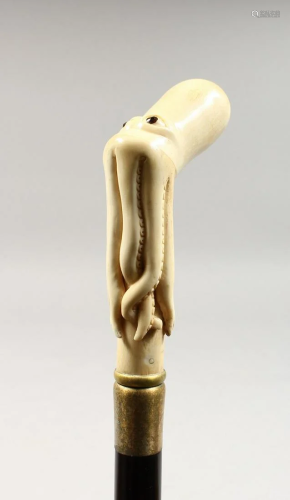 A CARVED BONE OCTOPUS HANDLE WALKING STICK