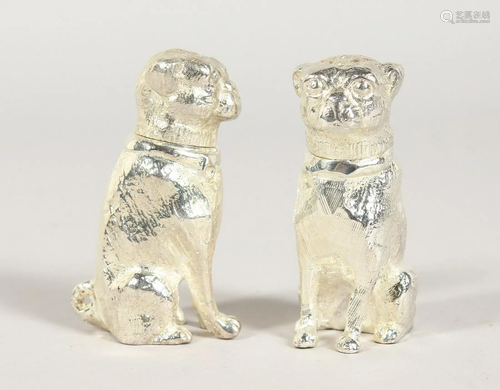 A PAIR OF CAST PLATE DOG SALT AND PEPPERS 2.25 ins