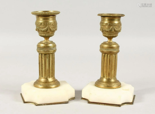 A SMALL PAIR OF ORMOLU AND MARBLE CANDLESTICKS. 5ins