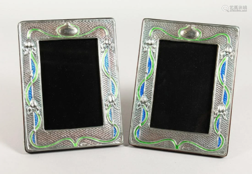 A GOOD PAIR OF SILVER AND ENAMEL PHOTOGRAPH FRAMES 7.5