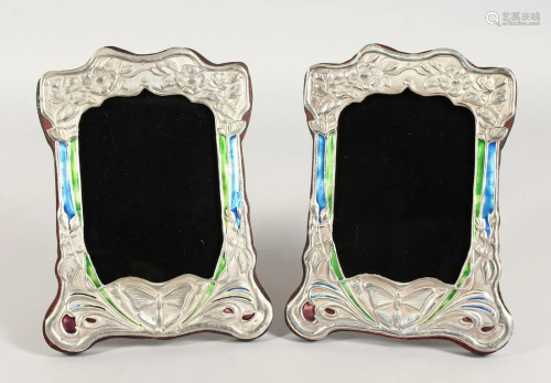 A GOOD PAIR OF SILVER AND ENAMEL PHOTOGRAPH FRAMES with