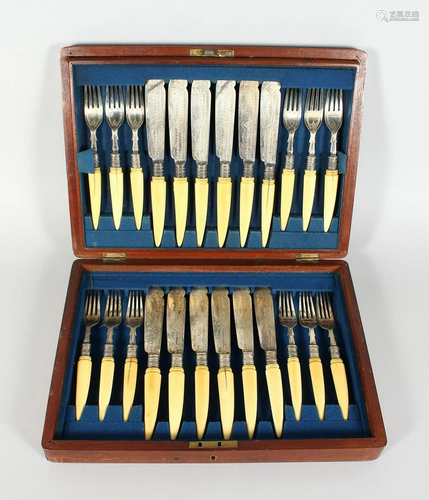 A MAHOGANY CANTEEN OF TWELVE BONE HANDLES FISH KNIVES