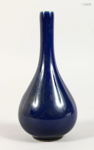 A SMALL CHINESE BLUE BOTTLE VASE Blue mark, 6 ins high