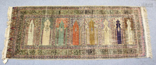 AN UNUSUAL PERSIAN PRAYER RUG, the central panel with