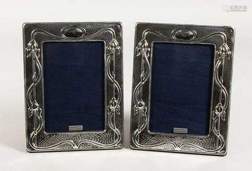 A PAIR OF ART NOUVEAU PHOTOGRAPH FRAMES 7 ins x 5 ins