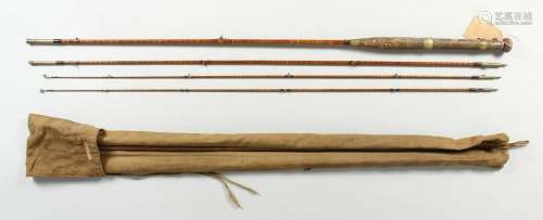 A FOUR PIECE SPLIT CANE FLY ROD, with cloth case.