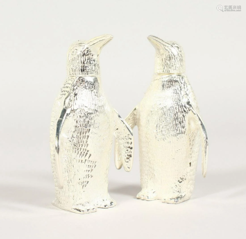A PAIR OF CAST PLATE PENGUIN SALT AND PEPPER