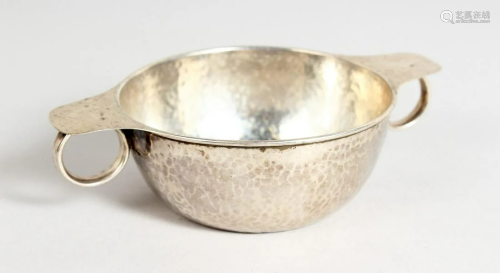 A LIBERTY & CO. CIRCULAR SILVER HAMMERED TWO HANDLED