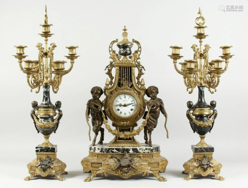 A LARGE FRENCH GILT METAL AND MARBLE THREE PIECE CLOCK