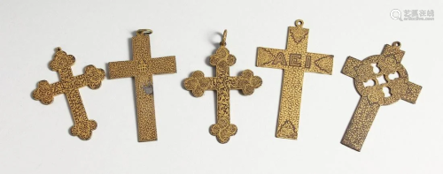 FIVE VARIOUS GILDED CROSSES, 2.25 to 3.5 inches long.