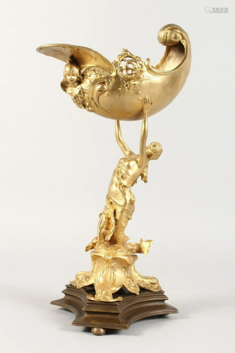 A GILT BRONZE SHELL with classical female support 16