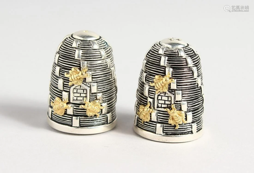 A PAIR OF 800 BEEHIVE SALT AND PEPPERS