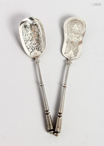TWO CONTINENTAL SILVER SPOONS with pierced bowls, 6