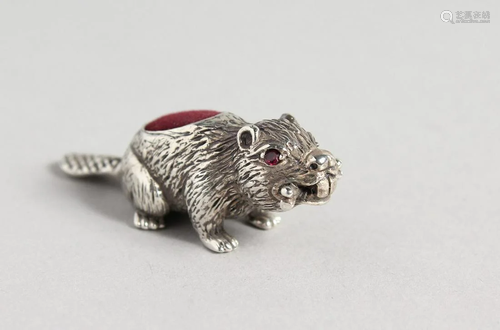 A SILVER BEAVER PIN CUSHION