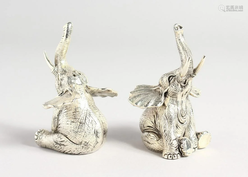 A PAIR OF 800 ELEPHANT SALT AND PEPPERS