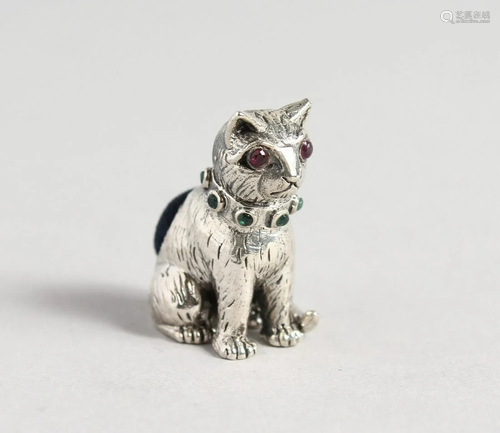 A SILVER SEATED CAT PIN CUSHION