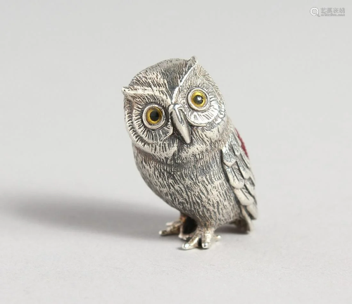 A SILVER OWL PIN CUSHION