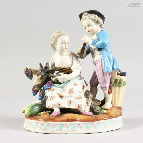 A 19TH CENTURY MEISSEN STYLE PORCELAIN GROUP OF A BOY