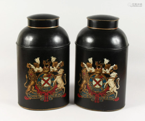 A PAIR OF CRESTED TOLE WARE TEA TINS AND COVERS 17