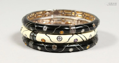 THREE SILVER AND ENAMEL BRACELETS