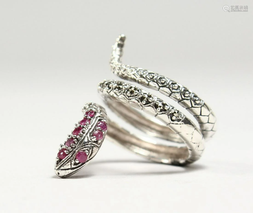 A SILVER RUBY SET SNAKE RING