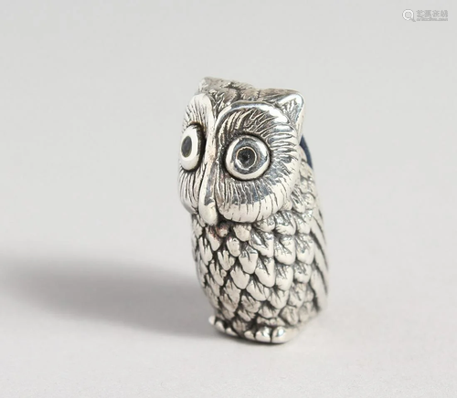 A SILVER OWL PIN CUSHION