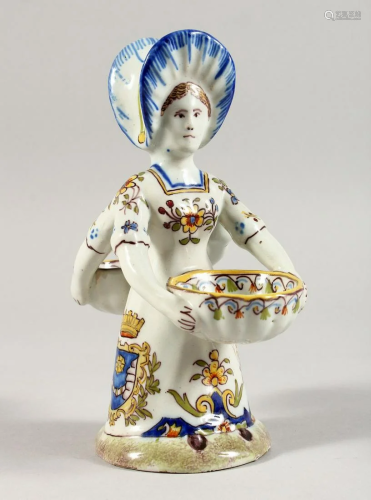 A DELFT DOUBLE SIDED SALT a young girl carrying two