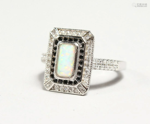 A SILVER ART DECO DESIGN OPAL RING