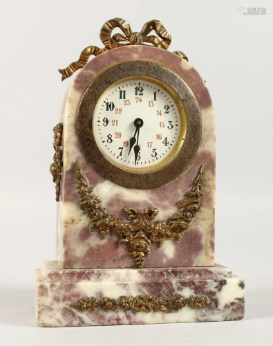 A SMALL VEINED MARBLE CLOCK with ormolu mount. 6.5ins