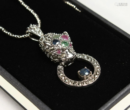 A SILVER SAPPHIRE, RUBY AND EMERALD PANTHER PENDANT AND